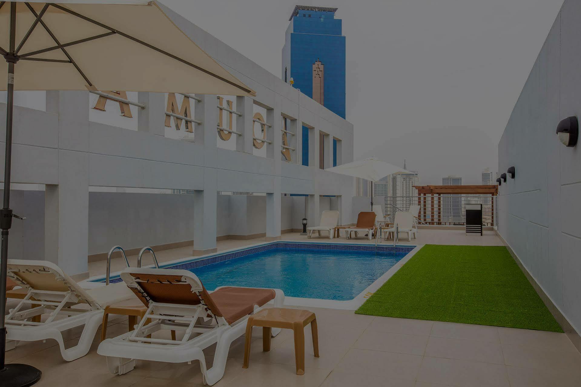 Loumage Suites And Spa Manama Exterior photo