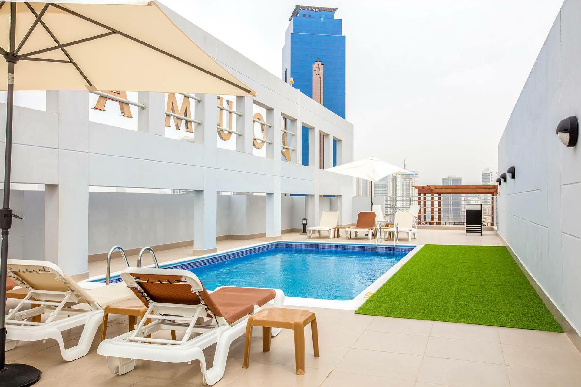 Loumage Suites And Spa Manama Exterior photo